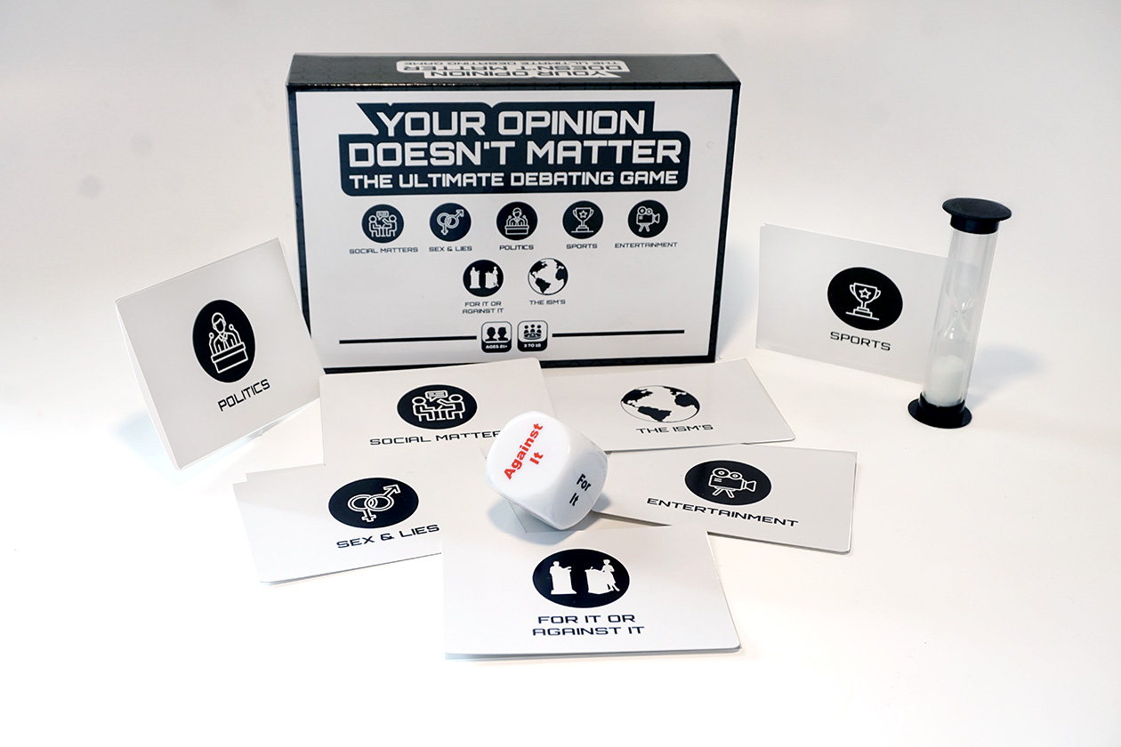 The YODM box with all seven category cards, the sand timer, and the For It or Against It die